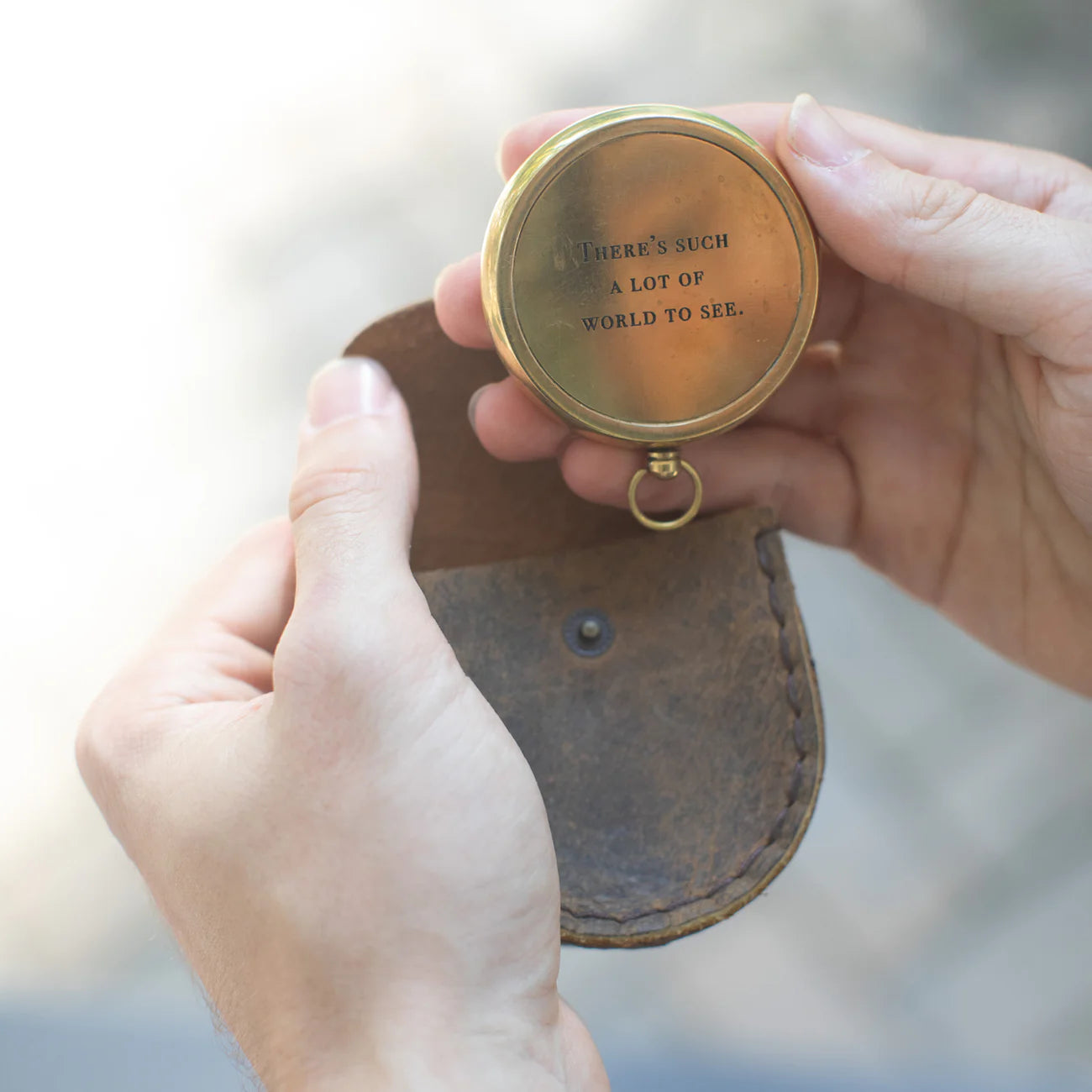 COMPASS WITH LEATHER POUCH - THERE'S SUCH A LOT OF WORLD TO SEE